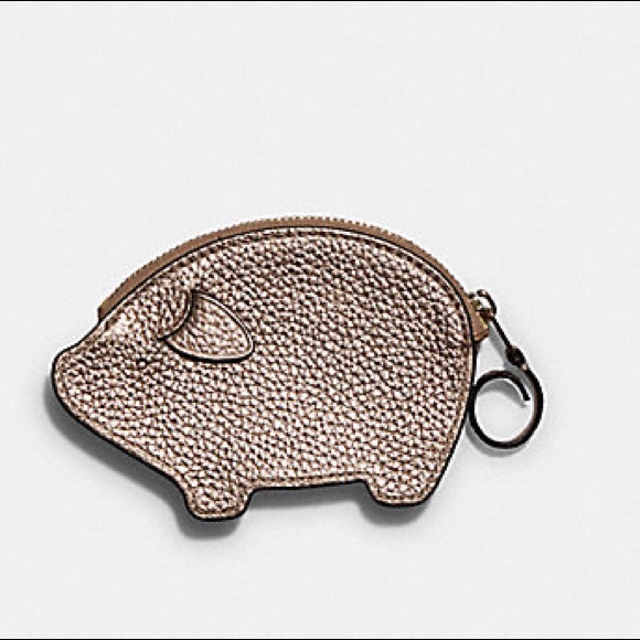 coach pig coin case